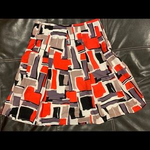 Red multi colored lined skirt.
